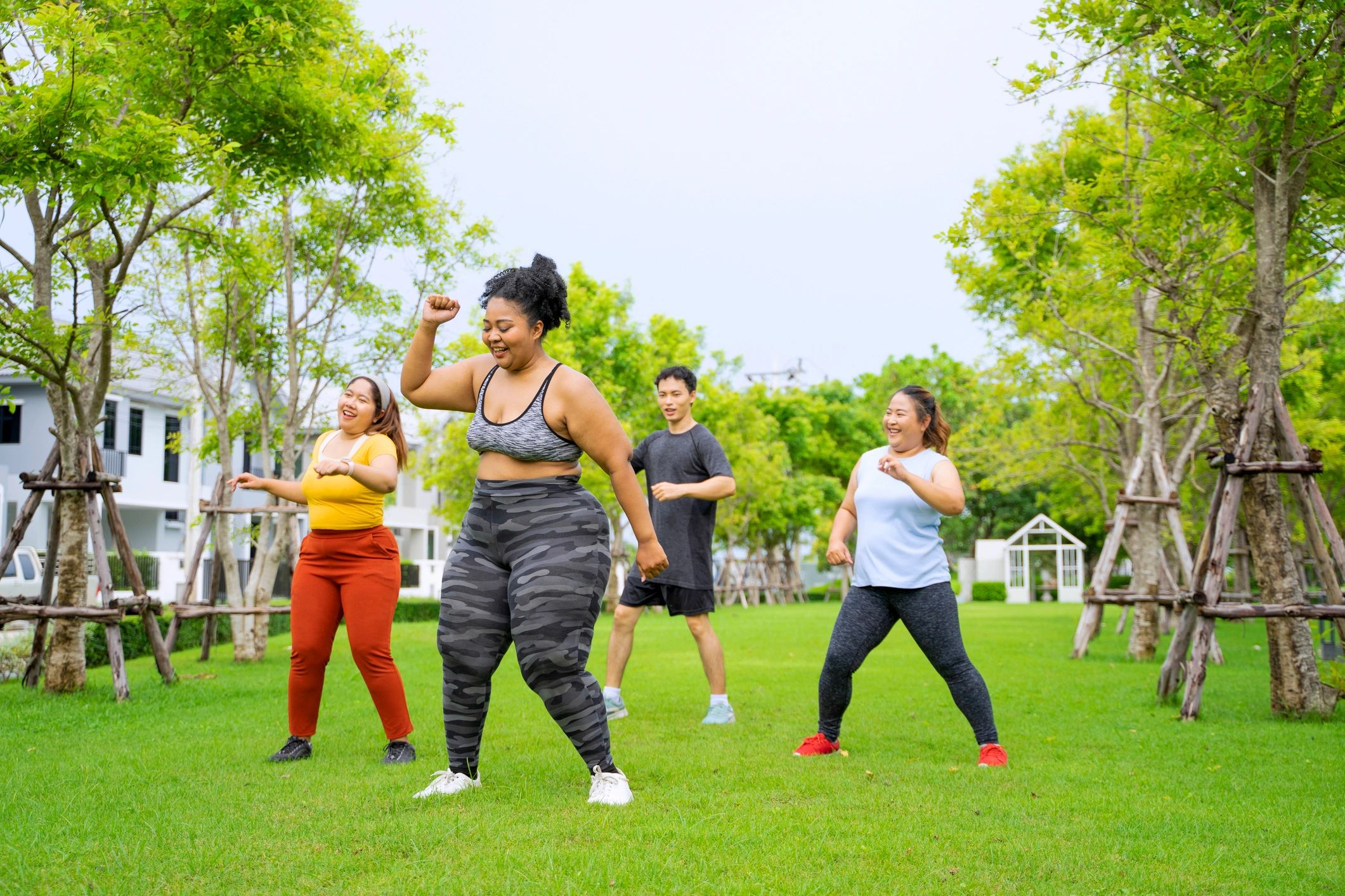 Group workout outdoors in a park