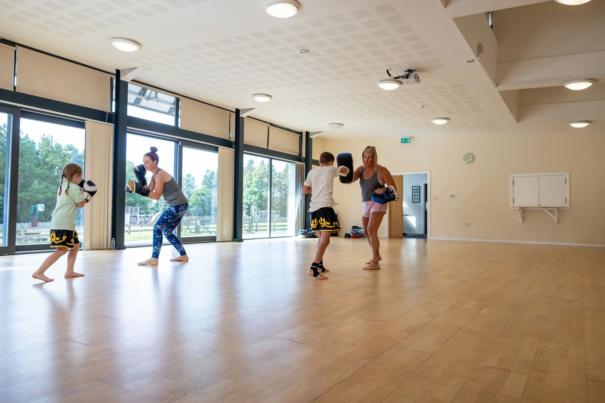 Small group kickboxing class training together