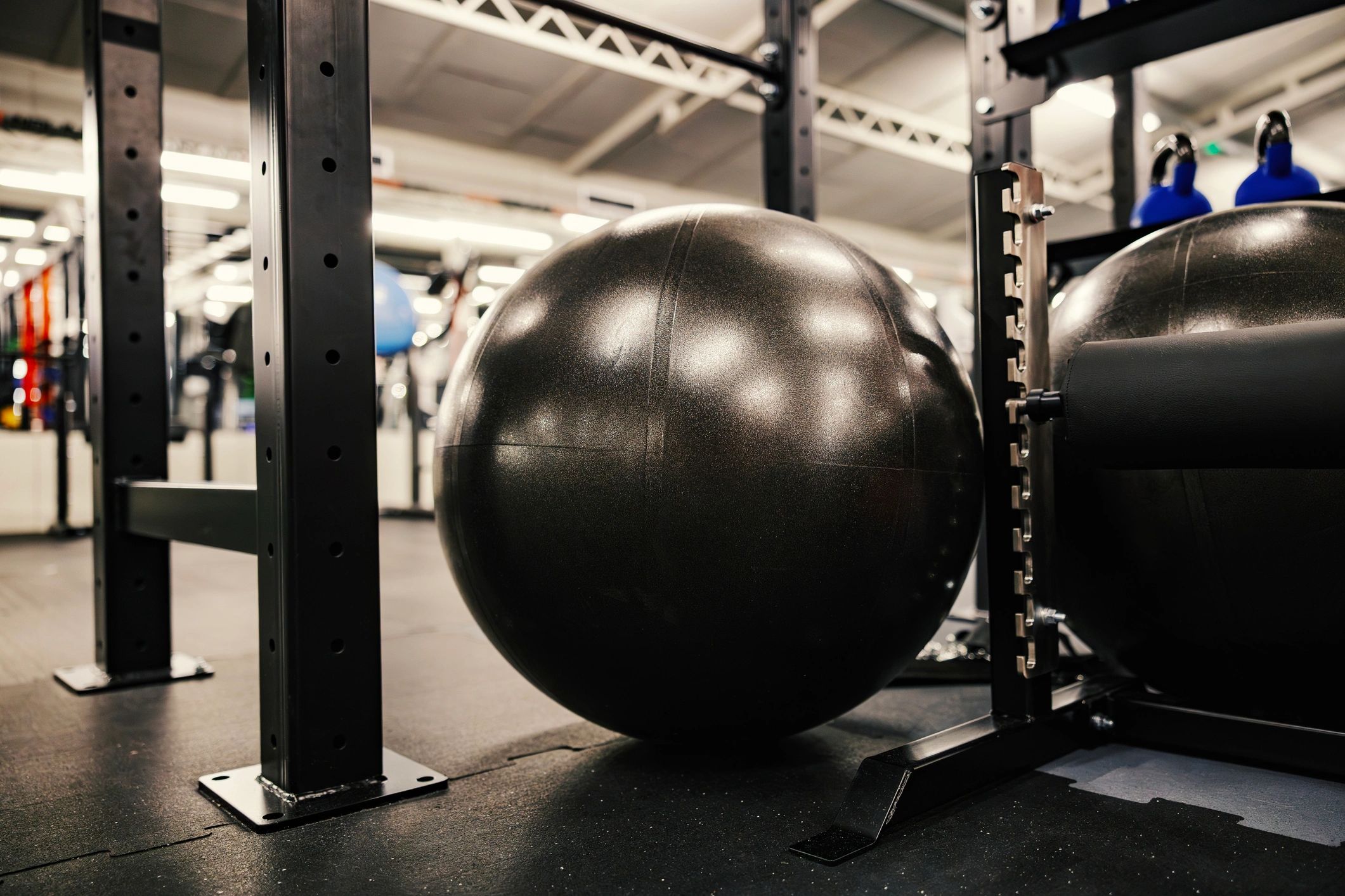 Stability ball on gym floor in a professional training space